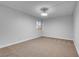 Bright bedroom features neutral carpet, white walls and a modern light fixture at 725 N Royal Crest Cir # 246, Las Vegas, NV 89169