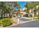 Welcoming Casablanca complex exterior with lush landscaping, mature trees, and well-maintained grounds at 725 N Royal Crest Cir # 246, Las Vegas, NV 89169