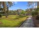 Well-maintained common area featuring lawn and mature trees at 725 N Royal Crest Cir # 246, Las Vegas, NV 89169
