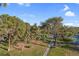 Well-manicured grounds with mature trees, walkways, and green space at 725 N Royal Crest Cir # 246, Las Vegas, NV 89169