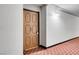 Hallway with unit door and patterned flooring at 725 N Royal Crest Cir # 246, Las Vegas, NV 89169
