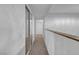 Neutral hallway with carpet and closet with mirrored sliding doors at 725 N Royal Crest Cir # 246, Las Vegas, NV 89169