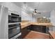 Kitchen with stainless appliances, and butcher block countertops at 725 N Royal Crest Cir # 246, Las Vegas, NV 89169