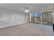 Spacious living room is filled with natural light from sliding glass doors to the balcony at 725 N Royal Crest Cir # 246, Las Vegas, NV 89169