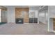 Living room view, highlighting the fireplace, bar area, and open layout at 725 N Royal Crest Cir # 246, Las Vegas, NV 89169