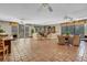 Spacious community lounge with comfortable seating, ceiling fans, tile flooring, and natural light at 725 N Royal Crest Cir # 246, Las Vegas, NV 89169