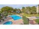 This community area has a large pool and hot tub surrounded by lush landscaping at 725 N Royal Crest Cir # 246, Las Vegas, NV 89169