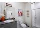 Bathroom featuring walk-in shower, vanity and decor at 7714 Duran Harbor Ln, North Las Vegas, NV 89084