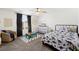 This bedroom is inviting, with natural light and plenty of room for toys and activities at 7714 Duran Harbor Ln, North Las Vegas, NV 89084