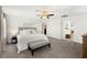 Bedroom with neutral decor, ceiling fan, and plenty of space at 7714 Duran Harbor Ln, North Las Vegas, NV 89084