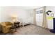 Bright Bedroom room with a crib, chair, and natural light at 7714 Duran Harbor Ln, North Las Vegas, NV 89084