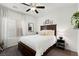 Cozy bedroom featuring a comfortable bed and natural light at 7714 Duran Harbor Ln, North Las Vegas, NV 89084