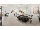 Bright dining room with tile flooring and a view of the kitchen at 7714 Duran Harbor Ln, North Las Vegas, NV 89084