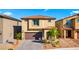 Charming two-story home with a two car garage and desert landscaping at 7714 Duran Harbor Ln, North Las Vegas, NV 89084