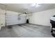 Spacious garage with an automatic door at 7714 Duran Harbor Ln, North Las Vegas, NV 89084