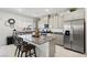 Contemporary kitchen with stainless steel appliances and granite countertops at 7714 Duran Harbor Ln, North Las Vegas, NV 89084