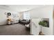 Spacious living room with carpet, natural light, and comfortable seating at 7714 Duran Harbor Ln, North Las Vegas, NV 89084