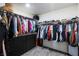 Spacious walk-in closet with custom shelving and plenty of storage space at 7714 Duran Harbor Ln, North Las Vegas, NV 89084