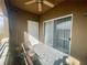 Balcony with outdoor seating and a ceiling fan, perfect for relaxing at 833 Aspen Peak Loop # 1021, Henderson, NV 89011