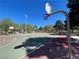Outdoor basketball court featuring multiple hoops and ample space for sports activities at 833 Aspen Peak Loop # 1021, Henderson, NV 89011