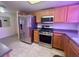 Modern kitchen with stainless steel appliances and dark countertops at 833 Aspen Peak Loop # 1021, Henderson, NV 89011