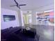 Contemporary living room design with an open kitchen and dining area, perfect for entertaining at 833 Aspen Peak Loop # 1021, Henderson, NV 89011