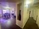 Open-concept living room with hardwood floors and modern decor at 833 Aspen Peak Loop # 1021, Henderson, NV 89011