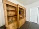 A built in living room cabinet with open shelving with shelves and doors at 833 Aspen Peak Loop # 1021, Henderson, NV 89011