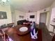 Cozy dining area flows into the living room, creating an ideal space for gatherings at 833 Aspen Peak Loop # 1021, Henderson, NV 89011