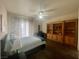 Spacious main bedroom with hardwood floors, built-in shelves, and natural light at 833 Aspen Peak Loop # 1021, Henderson, NV 89011