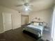 Comfortable main bedroom with hardwood floors, and natural light at 833 Aspen Peak Loop # 1021, Henderson, NV 89011