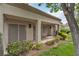 Back patio with desert landscaping and views of lush greenery at 8537 Glenmount Dr, Las Vegas, NV 89134