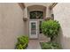 Inviting front entrance with decorative door and desert landscaping at 8537 Glenmount Dr, Las Vegas, NV 89134