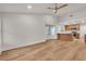 Bright living room with wood floors and a view of the kitchen at 8537 Glenmount Dr, Las Vegas, NV 89134