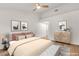 Peaceful main bedroom featuring hardwood floors, soft colors, and minimalist artwork, promoting rest at 8537 Glenmount Dr, Las Vegas, NV 89134