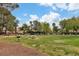 Picturesque park scene with picnic tables and lush greenery, ideal for outdoor gatherings and relaxation at 8537 Glenmount Dr, Las Vegas, NV 89134