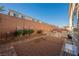 Backyard showcasing privacy walls and patio space, providing a perfect setting for outdoor gatherings and relaxation at 8543 Alpine Vineyards Ct, Las Vegas, NV 89139