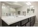 Bright bathroom features a double sink vanity and plenty of counter space at 8543 Alpine Vineyards Ct, Las Vegas, NV 89139