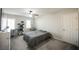 Bedroom with neutral walls, soft carpet, and windows bringing in light and air at 8543 Alpine Vineyards Ct, Las Vegas, NV 89139