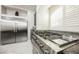 High-end kitchen stainless steel oven with granite countertops at 8543 Alpine Vineyards Ct, Las Vegas, NV 89139