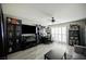Spacious living room features bright paint, wood-look floors and bright lighting at 8543 Alpine Vineyards Ct, Las Vegas, NV 89139