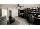 Spacious living room features bright paint, wood-look floors and bright lighting at 8543 Alpine Vineyards Ct, Las Vegas, NV 89139
