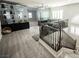 Loft showcases lots of natural light, plush seating, and seamless access to the staircase at 8543 Alpine Vineyards Ct, Las Vegas, NV 89139