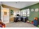 room with play area, desk, and easy access to an ensuite bathroom at 8636 Caribbean Ct, Las Vegas, NV 89117