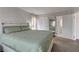Bright bedroom with a plush bed, soft natural light, and stylish decor at 8636 Caribbean Ct, Las Vegas, NV 89117