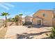 Large backyard features a block fence, desert landscaping and room to build a pool! at 91 Bowler Springs St, Las Vegas, NV 89148