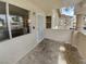 A cozy covered front porch with tile flooring and a security door welcomes you home at 913 Boulder Springs Dr # 202, Las Vegas, NV 89128