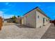 Backyard featuring a gravel ground cover, wooden fence, and exterior view of the home at 974 Balzar Ave, Las Vegas, NV 89106