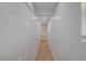 Hallway with hardwood floors, white walls, and recessed lighting leading to bedrooms at 974 Balzar Ave, Las Vegas, NV 89106