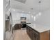 Bright kitchen with a large island, stainless steel appliances, and pendant lighting at 974 Balzar Ave, Las Vegas, NV 89106